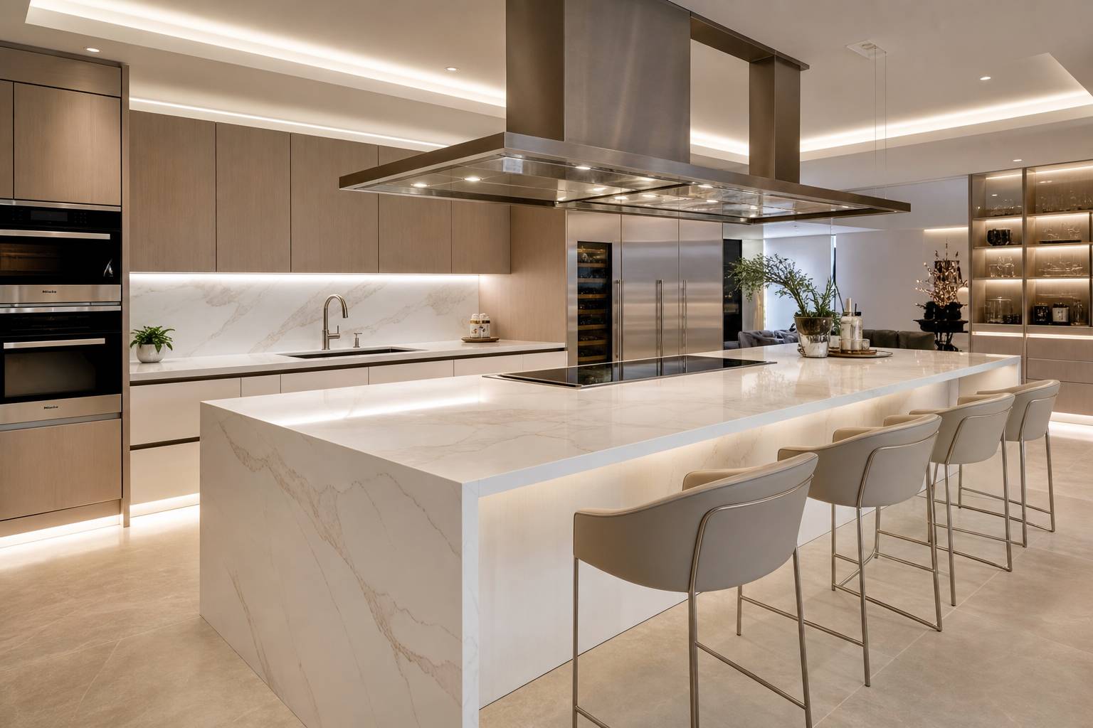 Cuisine design avec hotte suspendue acier au-dessus îlot central